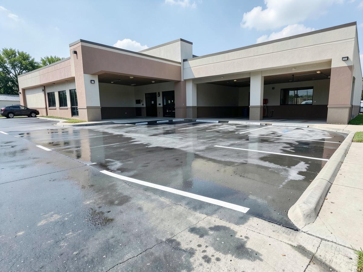 Pressure-washed commercial parking lot and concrete surfaces